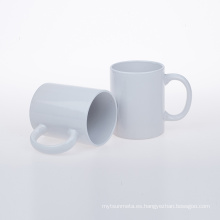 Taza de sublimación de China 11oz taza blanca en blanco de transferencia de calor